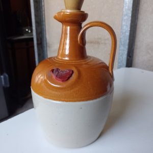 Antigua botella jarra de ceramica